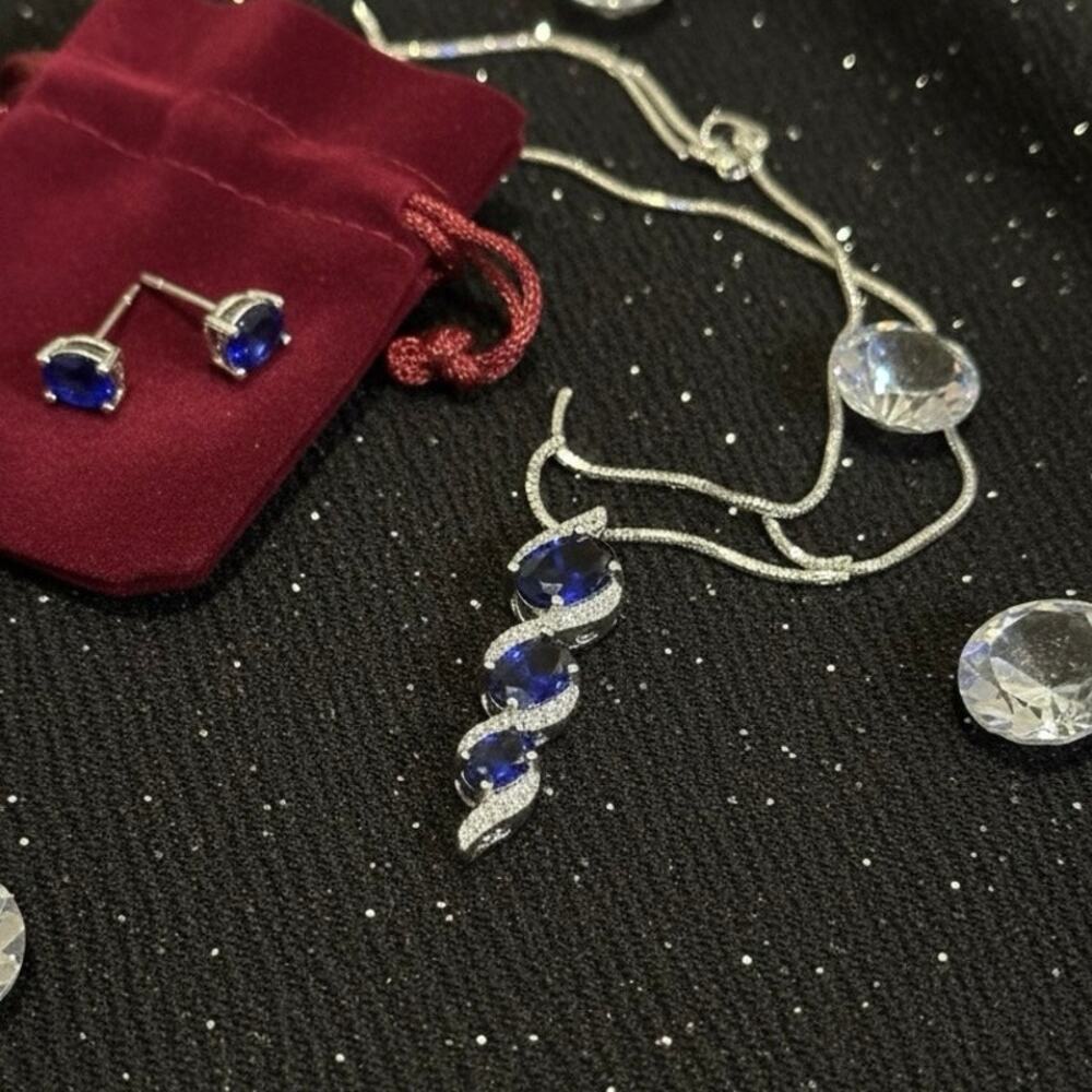 Sterling Silver Created Blue Sapphire & White Topaz S Design Pendant